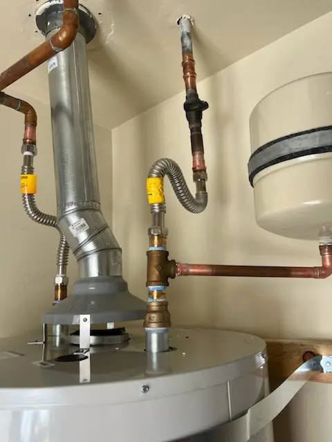 Water heater installation and plumbing repair in The Heathers